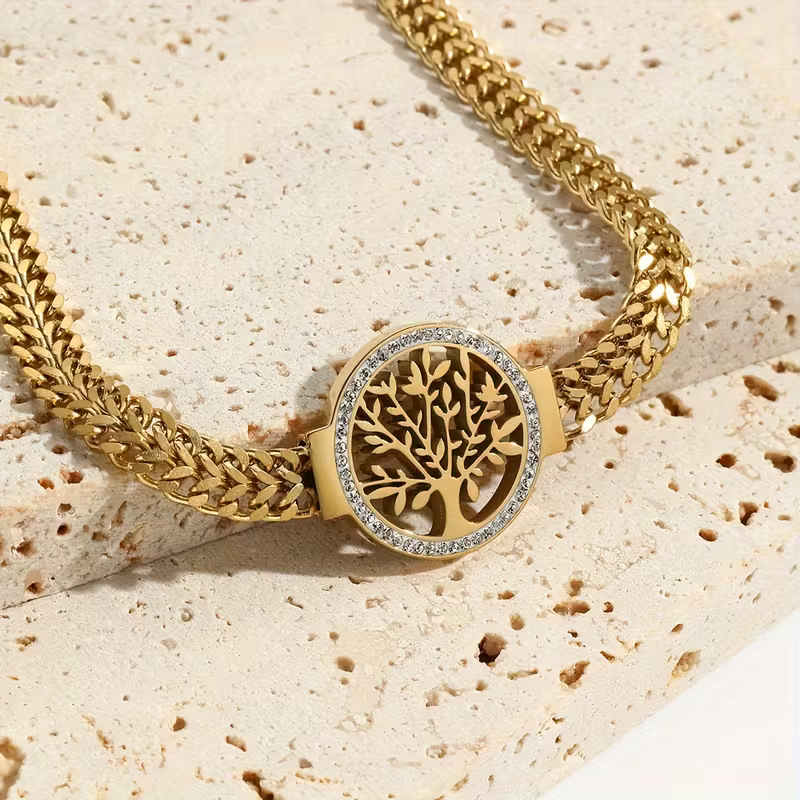 Gouden armband met levensboom en zirconia