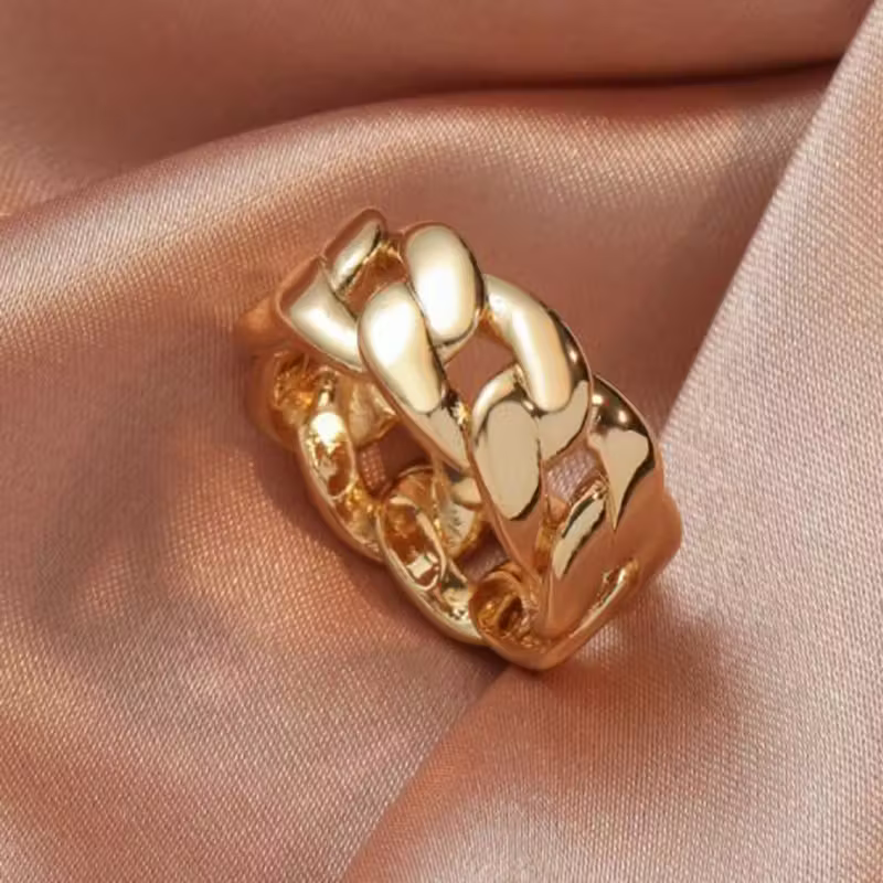 Gouden schakelring met curb-motief