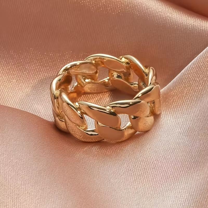 Gouden schakelring met curb-motief