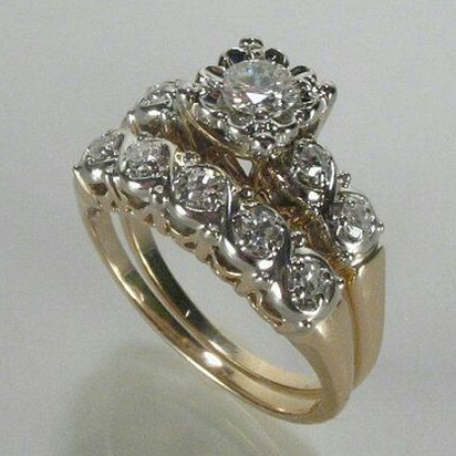 Vintage gouden bruidsringenset met zirkonia