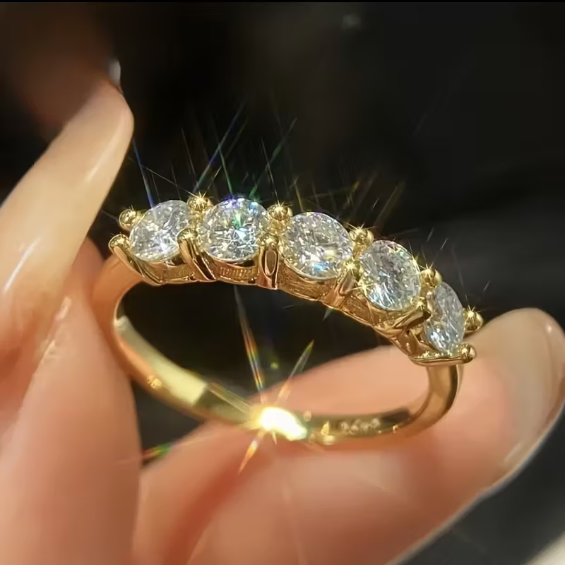 Gouden ring met vijf ovale zirconia