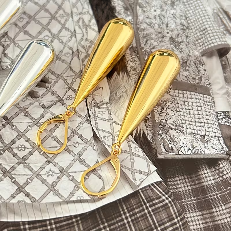 Gouden oorbellen met druppelhanger