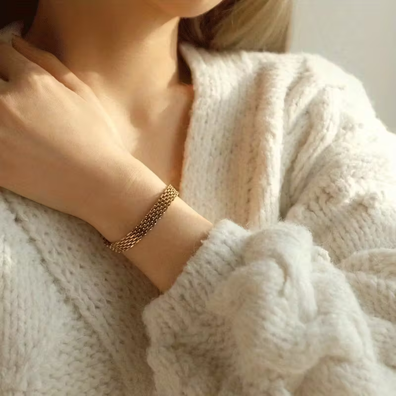 Brede gouden gevlochten mesh-armband