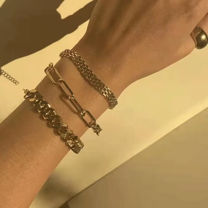Brede gouden gevlochten mesh-armband