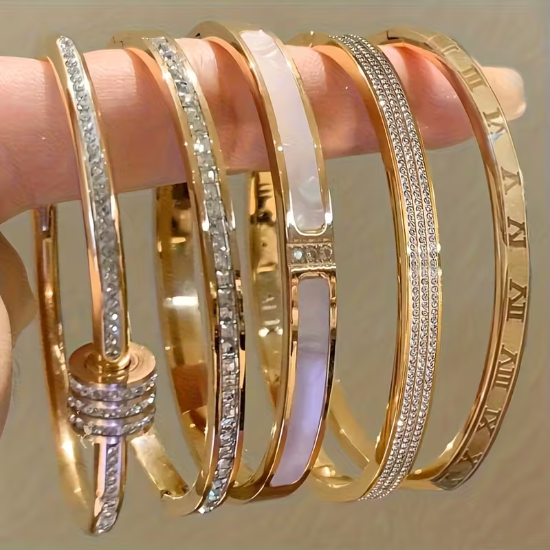 Gouden armbandenset met parelmoer en zirkonia