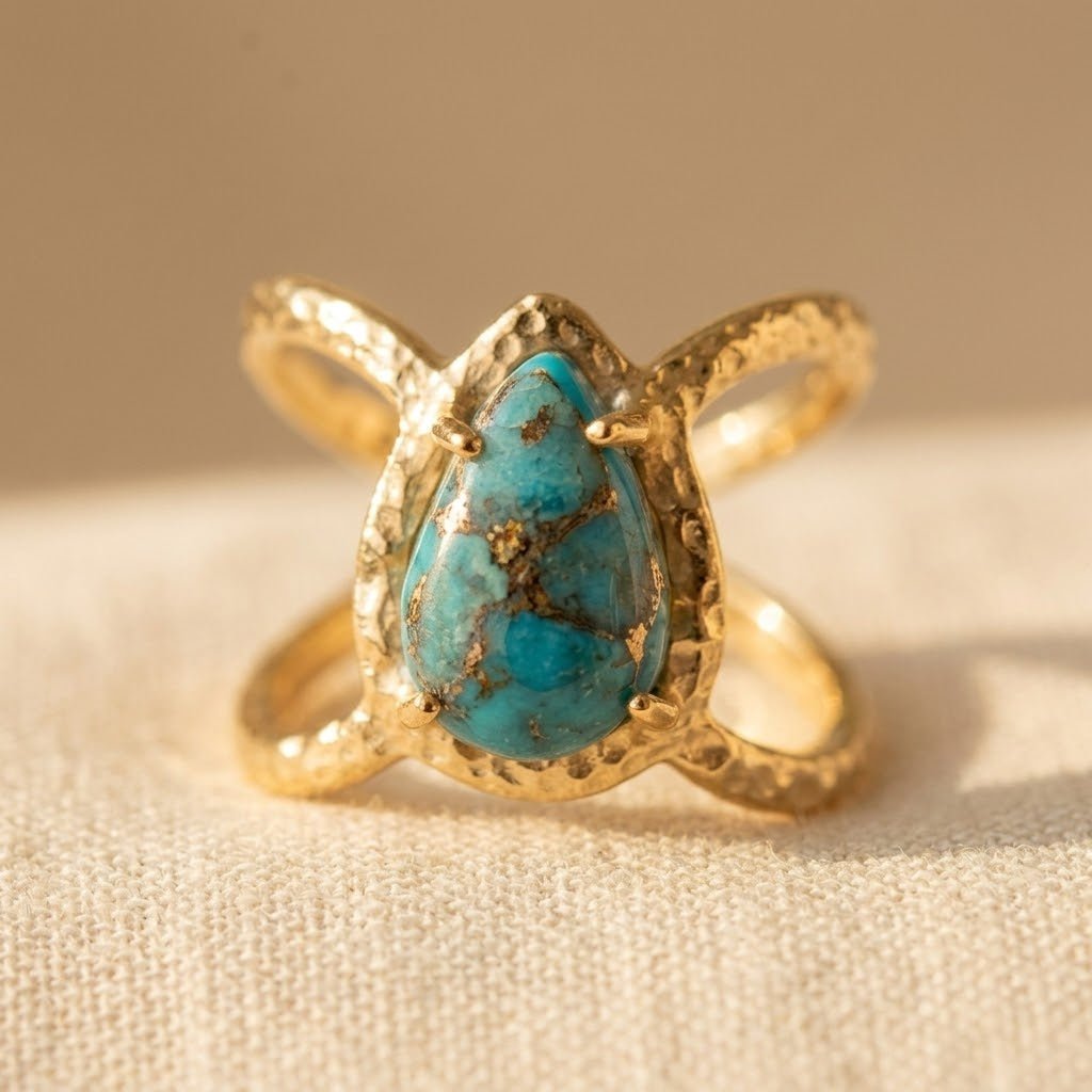 Gouden ring met druppelvormig turkoois