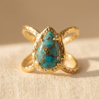 Gouden ring met druppelvormig turkoois