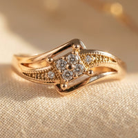 Roségouden ring met vierkante zirkonia cluster