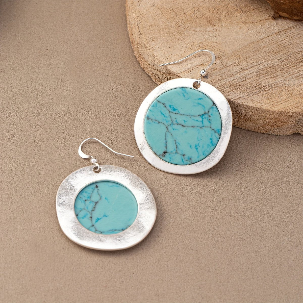 Zilveren oorbellen met ronde turquoise schijf