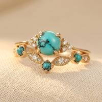 Roségoud ring met turquoise en zirkonia