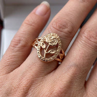 Roségouden ring met blad en ronde steen