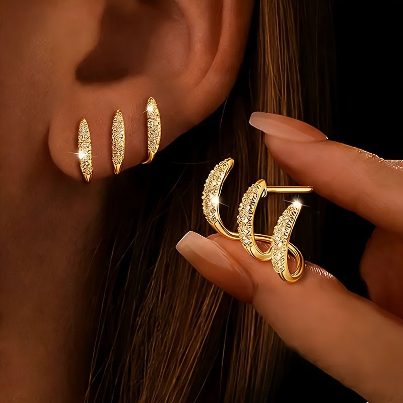Gouden oorbellenset met zirkonia studs en hoops