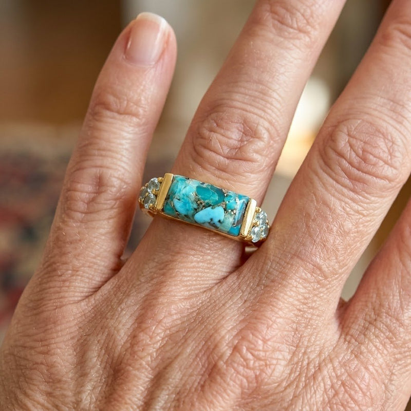 Gouden ring met turkoois en blauwe edelstenen