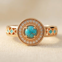 Roségouden ring met turkoois en zirkonia halo
