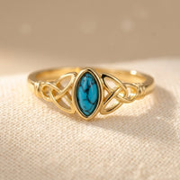 Gouden keltische ring met ovaal turkoois