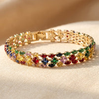 Gouden armband met kleurrijke edelstenen