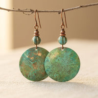 Bohemian oorbellen met turquoise schijf