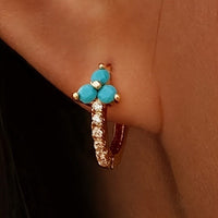 Gouden oorbellen met turquoise en zirkonia