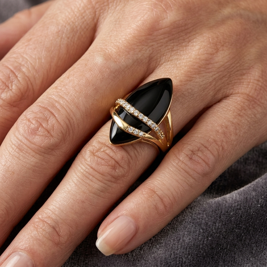 Gouden ring met grote zwarte marquise onyx