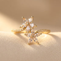 Gouden dubbele bloemring met marquise zirkonia