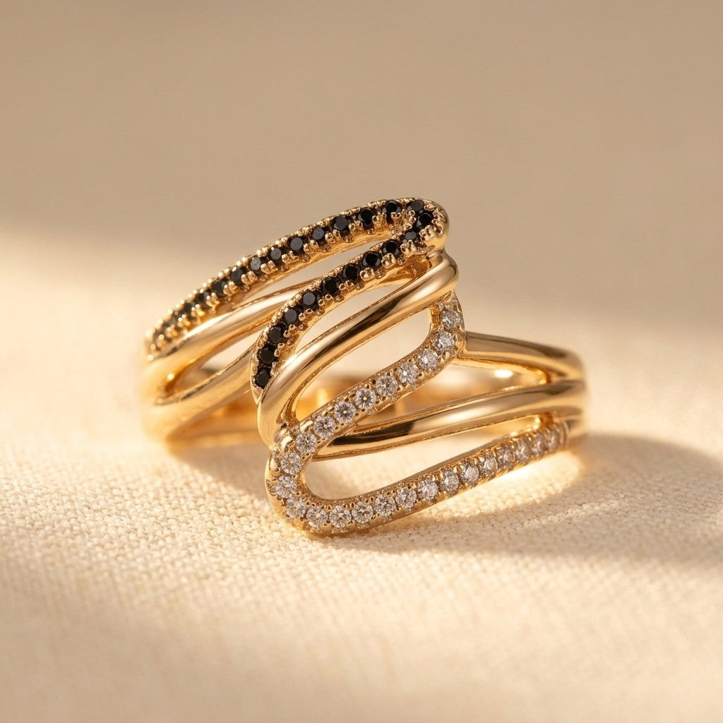 Gouden meerlaagse ring met zwarte en witte zirkonia