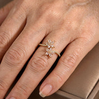 Gouden dubbele bloemenring met marquise zirkonia