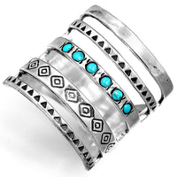 Brede zilveren ring met turquoise in Azteekse stijl