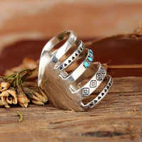 Brede zilveren ring met turquoise in Azteekse stijl